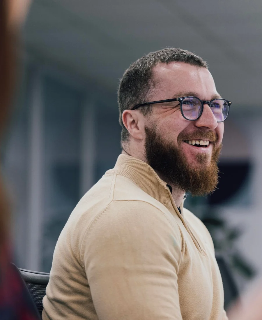 Dan, founder of RPA, smiling mid-conversation